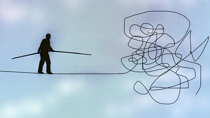 This image has an empty alt attribute; its file name is tightrope-walker.jpg